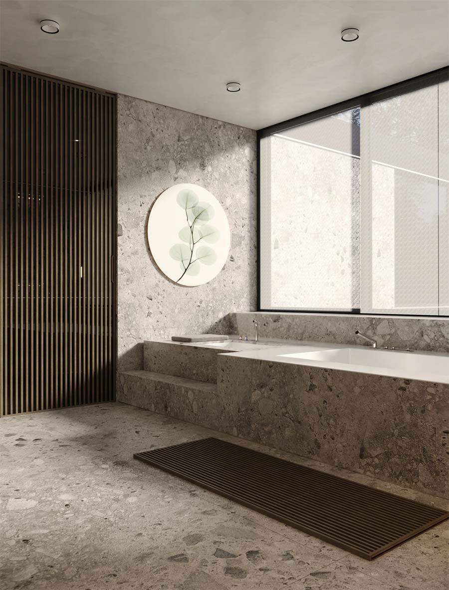 Luxe badkamer met een mooi betonlook plafond met inbouwspotjes.