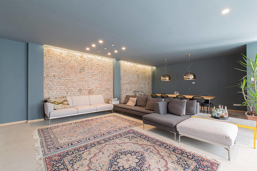 Deze stoere loft woonkamer is strak en stijlvol ingericht