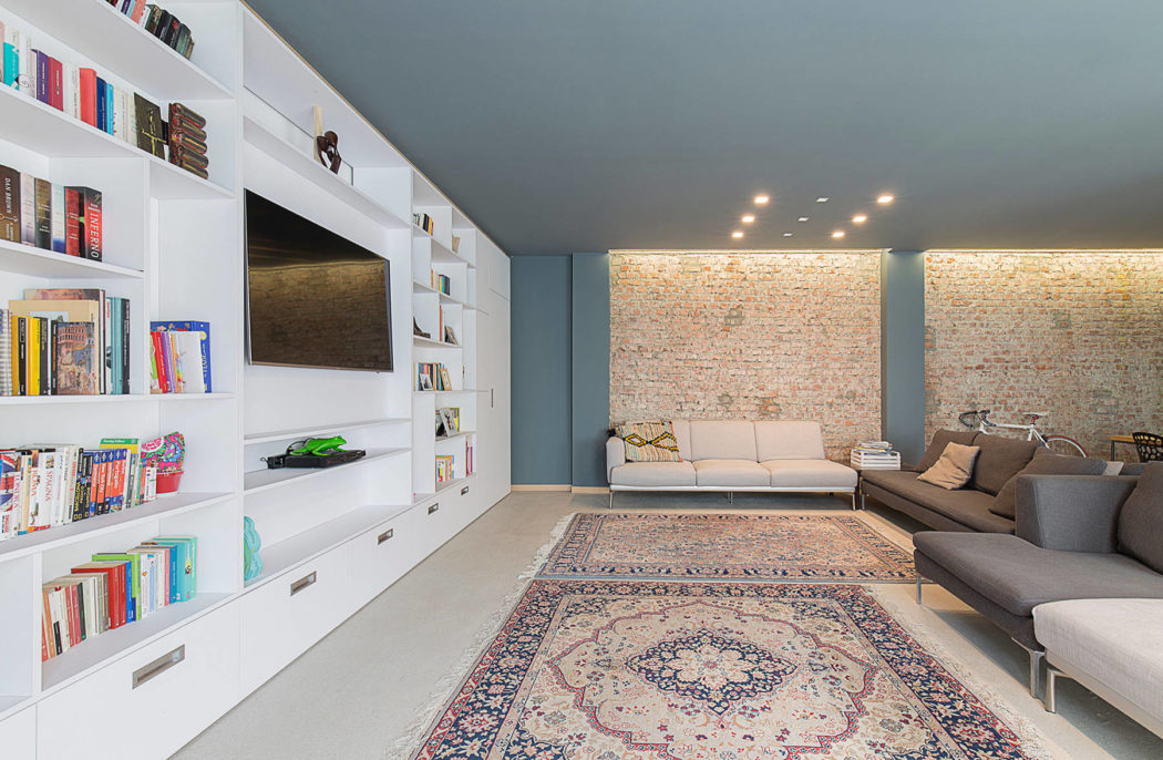 Deze stoere loft woonkamer is strak en stijlvol ingericht