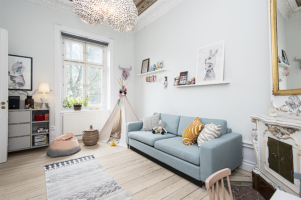 In dit appartement hebben ze de karakteristieke originele details gecombineerd met een Scandinavisch interieur