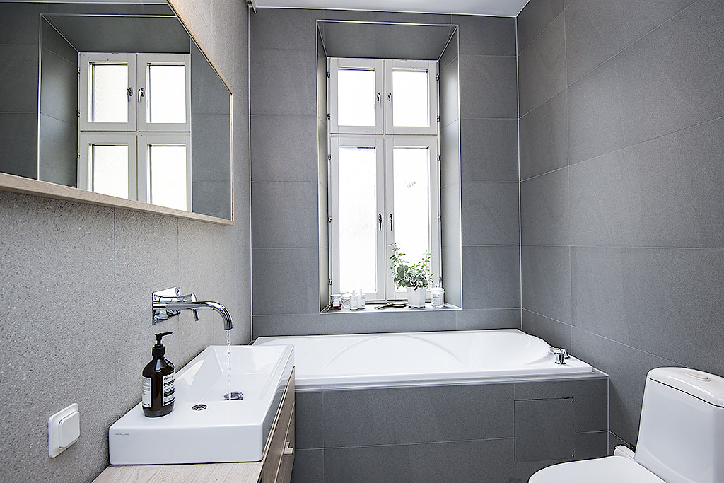 In dit appartement hebben ze de karakteristieke originele details gecombineerd met een Scandinavisch interieur