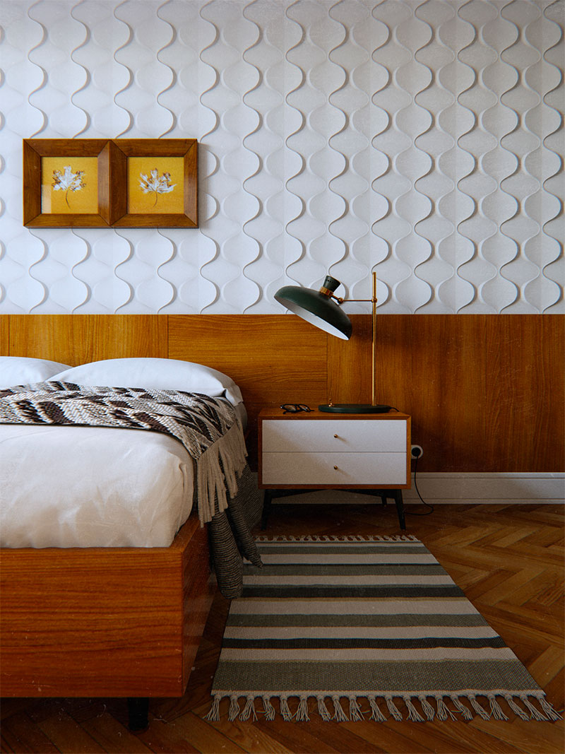 Oleksii Naumov heeft deze stijlvolle mooie retro slaapkamer in jaren 70 interieurstijl ontworpen, waar houten accenten gecombineed zijn met een mooi retro patroon aan de muur boven het bed.