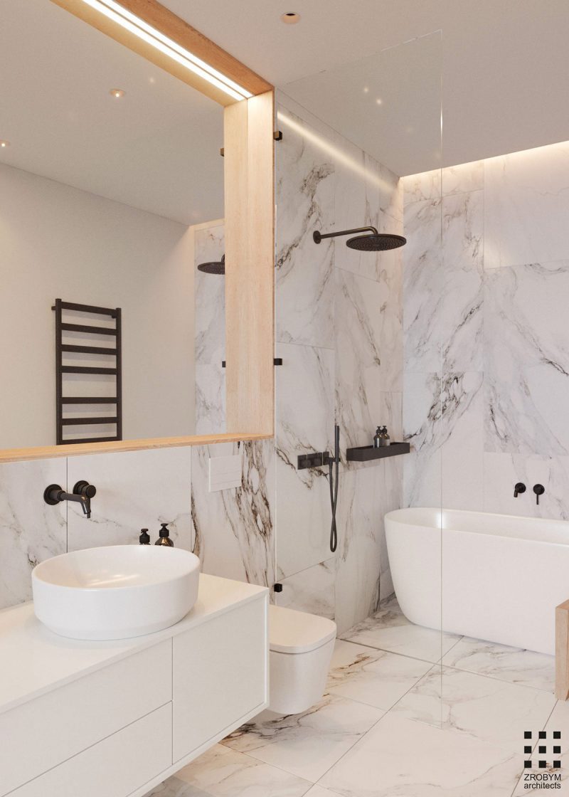 Het luxe badkamerontwerp van badkamerontwerp is gerealiseerd door Zrobym Architects bevat zowel witte marmeren vloer- als wandtegels, én stoere zwarte accenten.