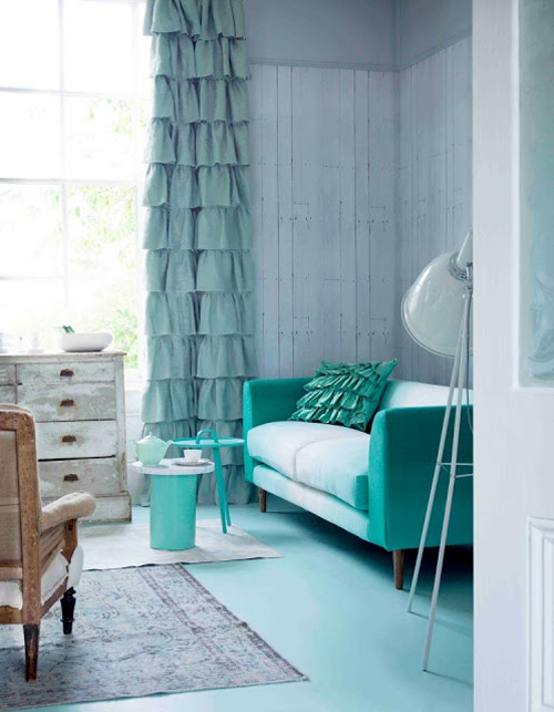 Mintgroene woonkamer