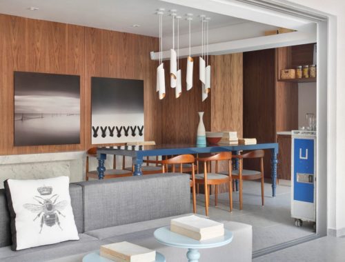 Speelse moderne woonkamer met marmer en kastanjehout