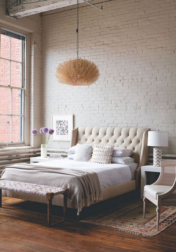 Witte bakstenen muur slaapkamer