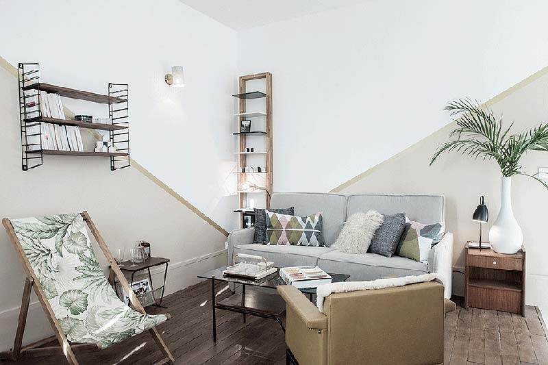 woonkamer ideeën geometrische kleurvlakken muur